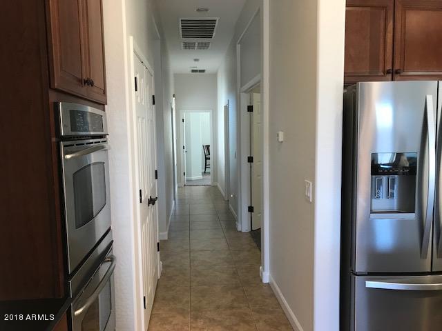 2112 West Eagle Feather Road Phoenix, AZ 85085 - Photo 7 of 16 hallway to bedrooms