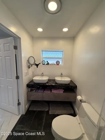 a view of swimming pool with a backyard