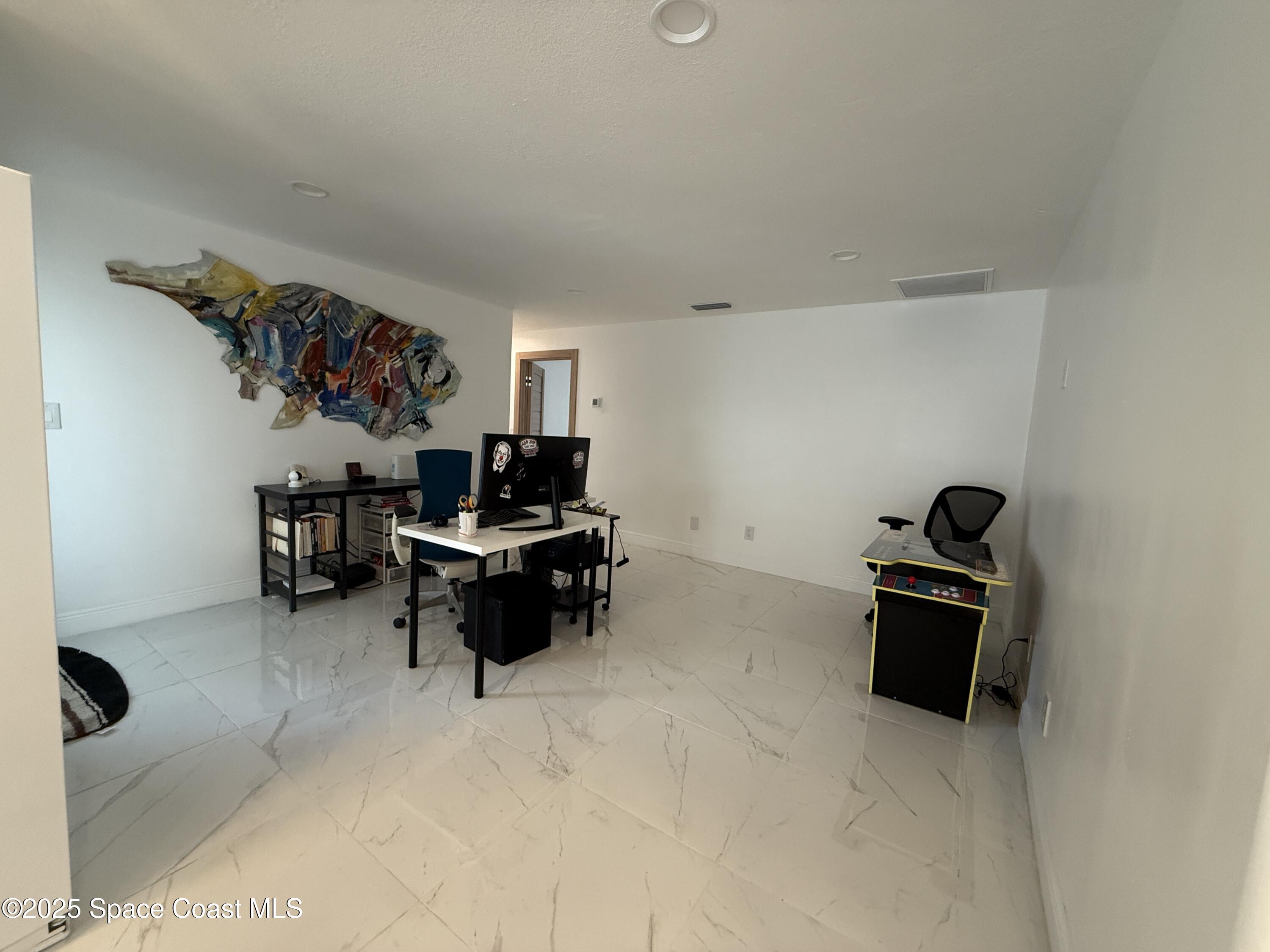 306 School Road Indian Harbour Beach, FL 32937 - Photo 6 of 21 a living room with furniture and a piano