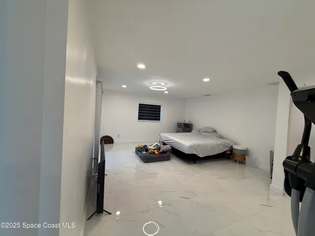 a bathroom with a mirror and a sink