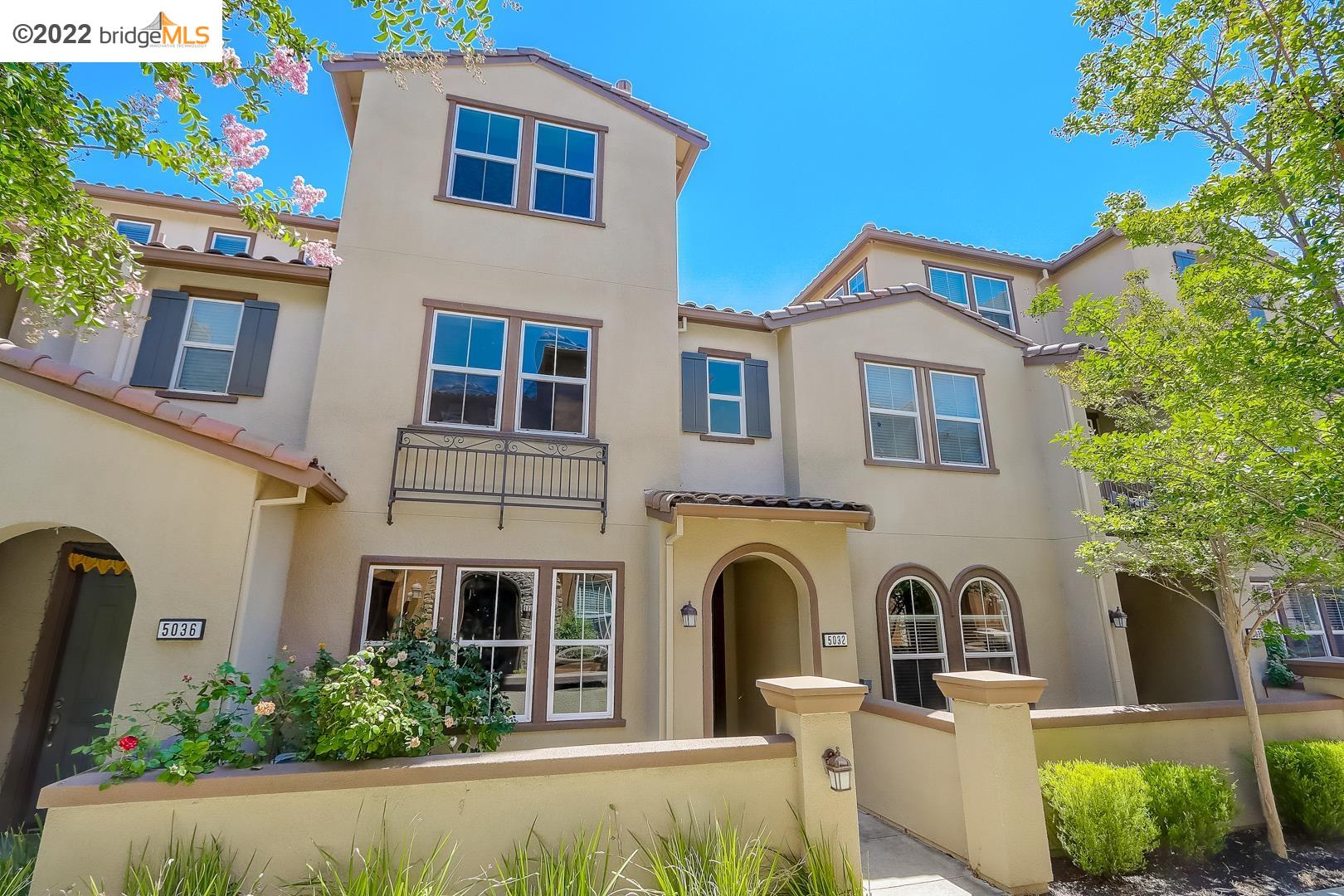5032 Fioli Loop San Ramon, CA 94582 - Photo 1 of 1 a front view of a house with garden