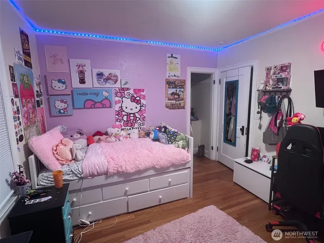 a bedroom with a bed and a walk in closet