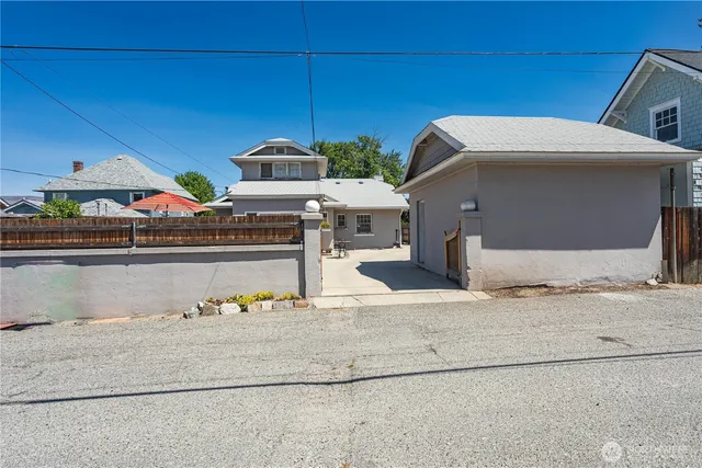 a view of a street with houses