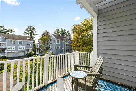 a view of a chair in wooden deck