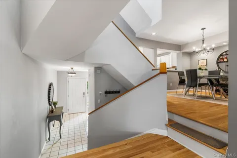 a view of a living room and dining room