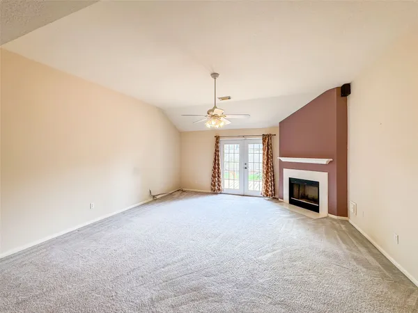 a kitchen with a sink a stove and cabinets