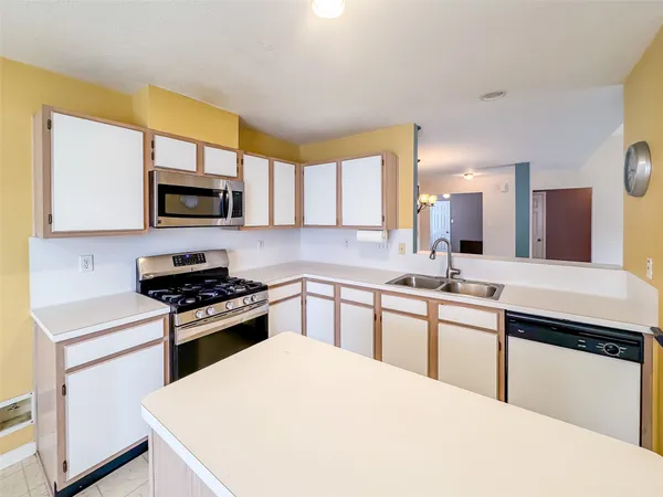a bathroom with a sink and a shower