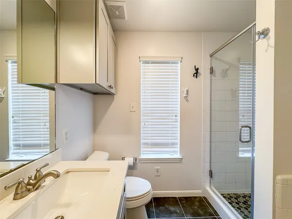 a view of backyard with a garden and plants