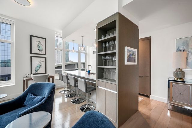 a view of a kitchen and dining room
