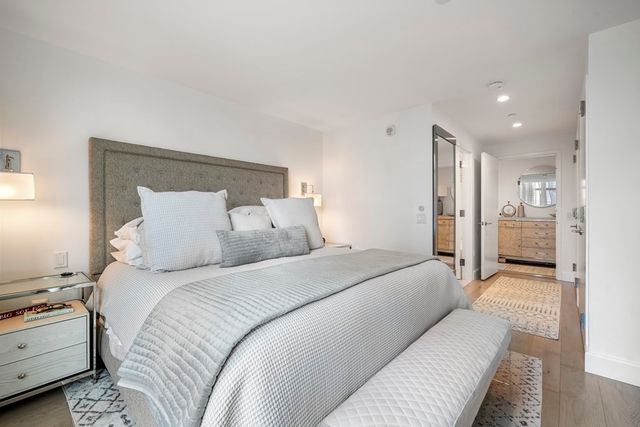 a bed room with a bed and a view