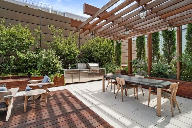 a view of a patio on the roof deck