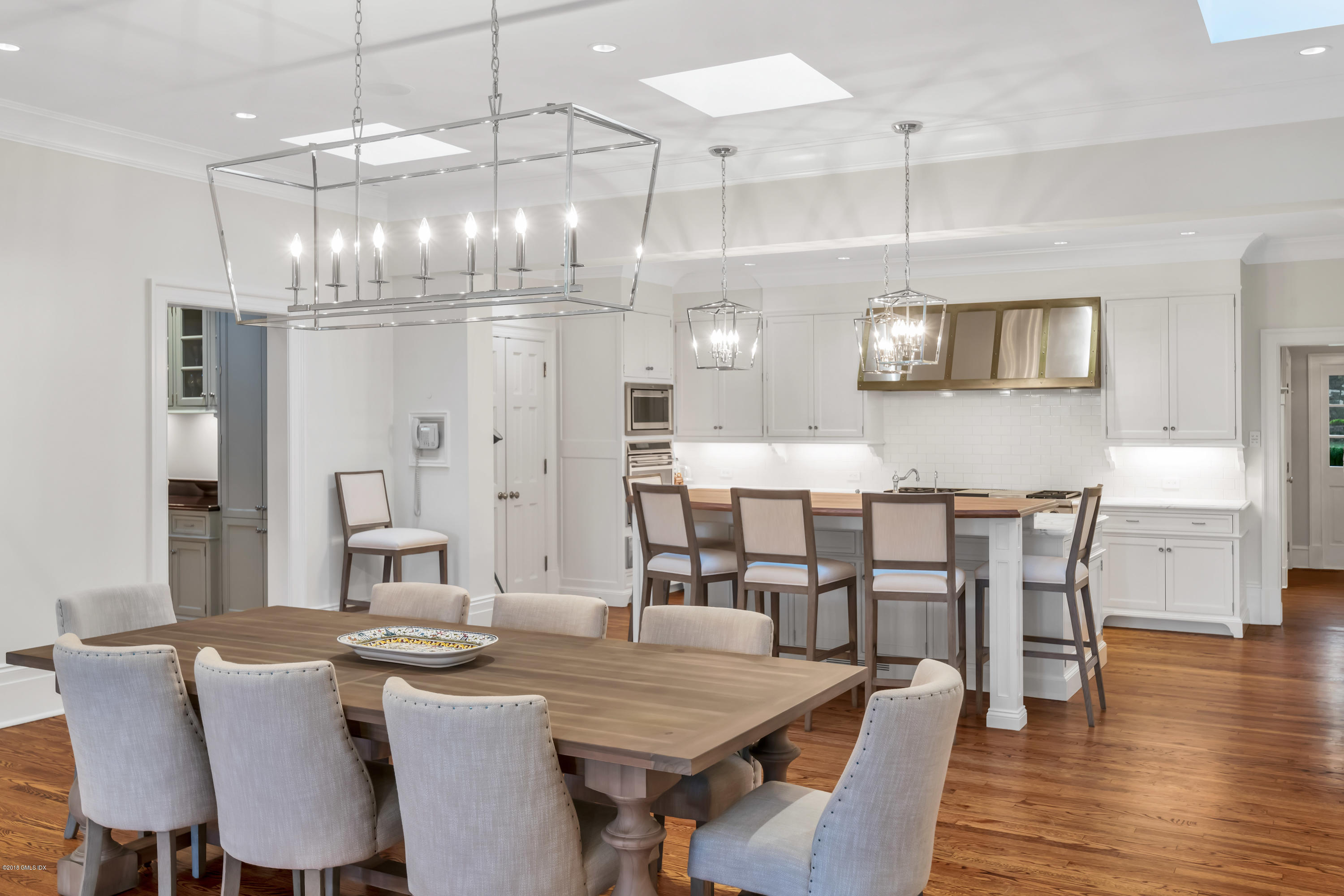 449 Round Hill Road Greenwich, CT 06831 - Photo 17 of 57 a view of a dining room with furniture and wooden floor