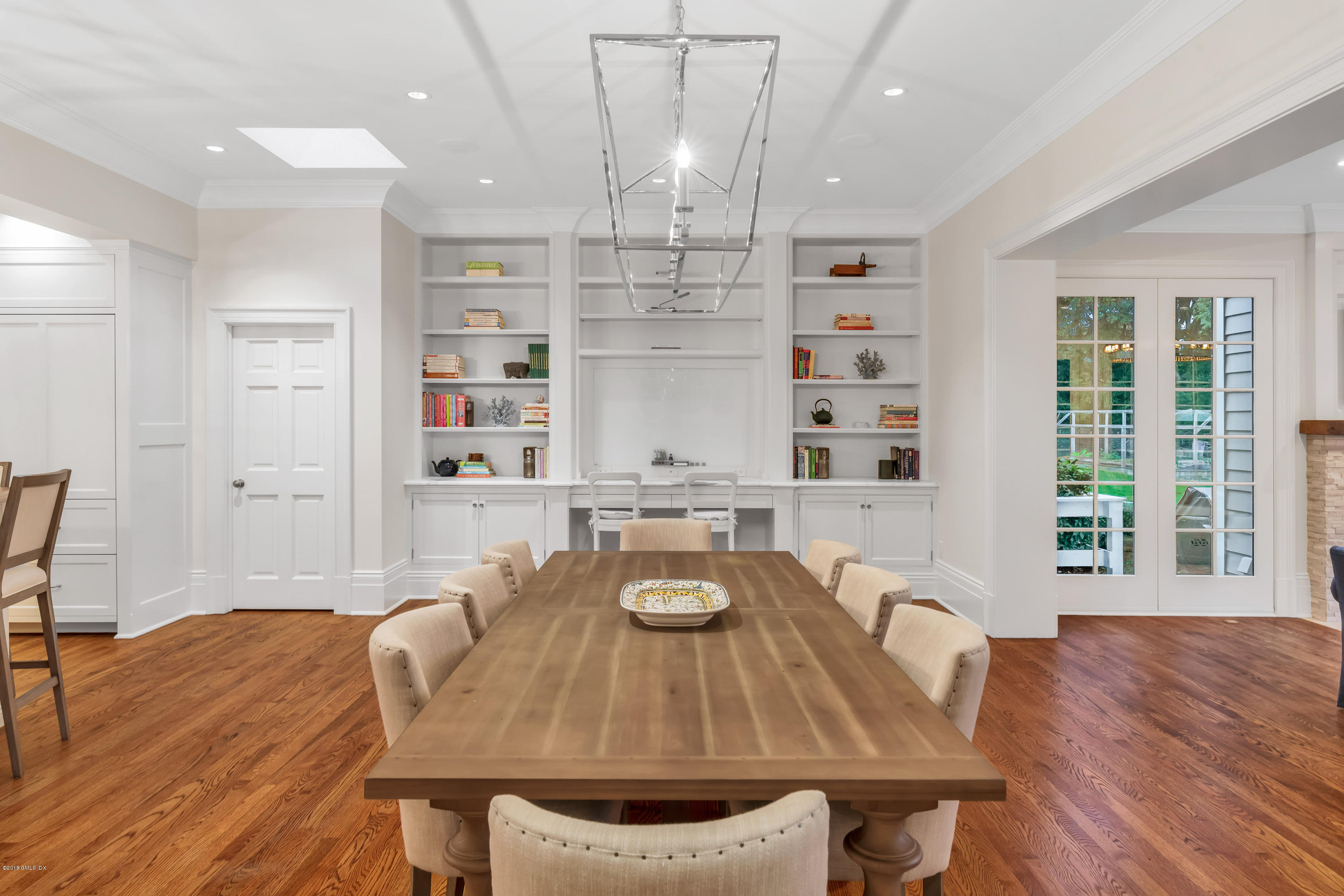 449 Round Hill Road Greenwich, CT 06831 - Photo 19 of 57 a view of a dining room with furniture and wooden floor