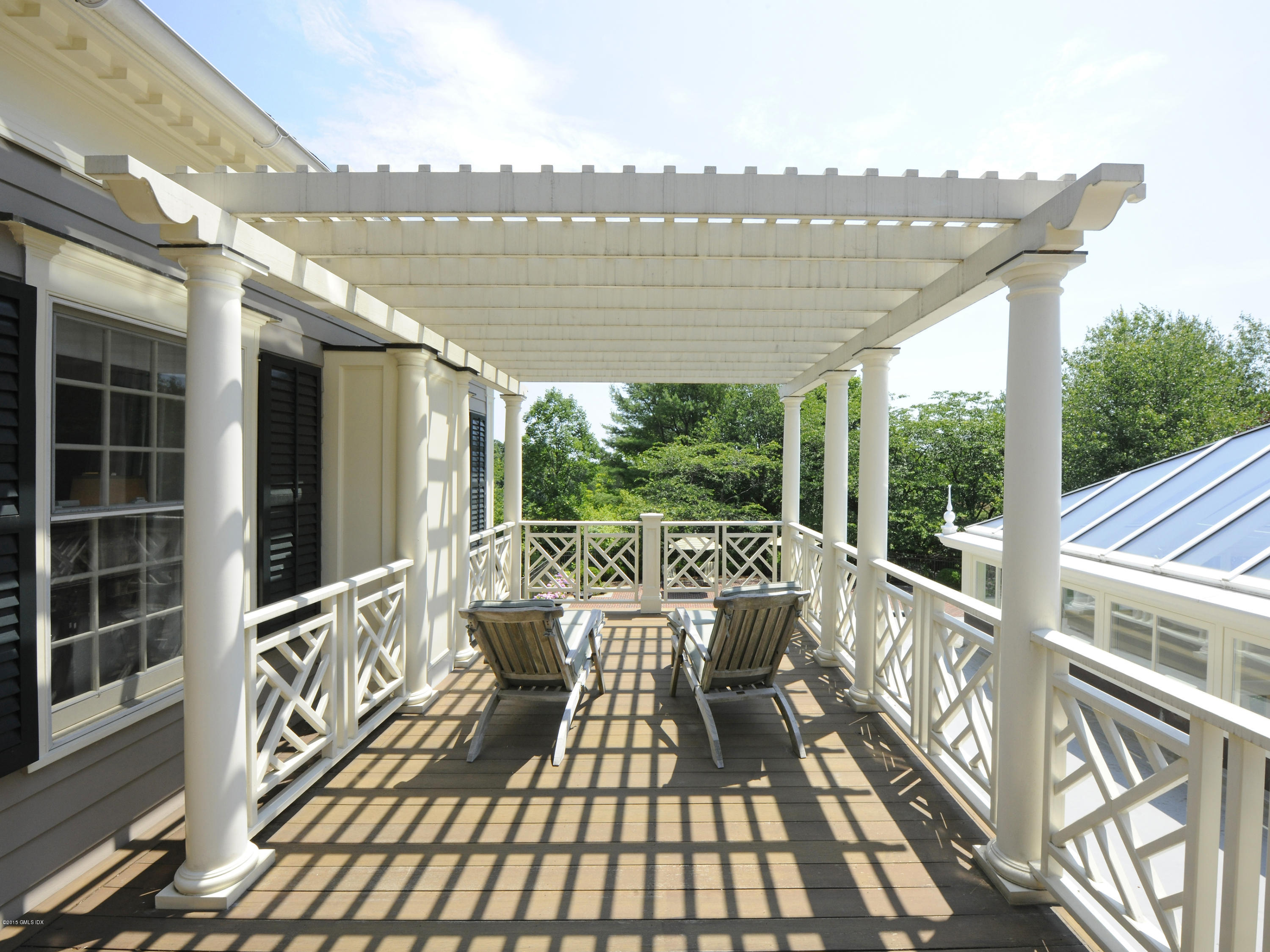 449 Round Hill Road Greenwich, CT 06831 - Photo 36 of 57 a view of balcony with furniture