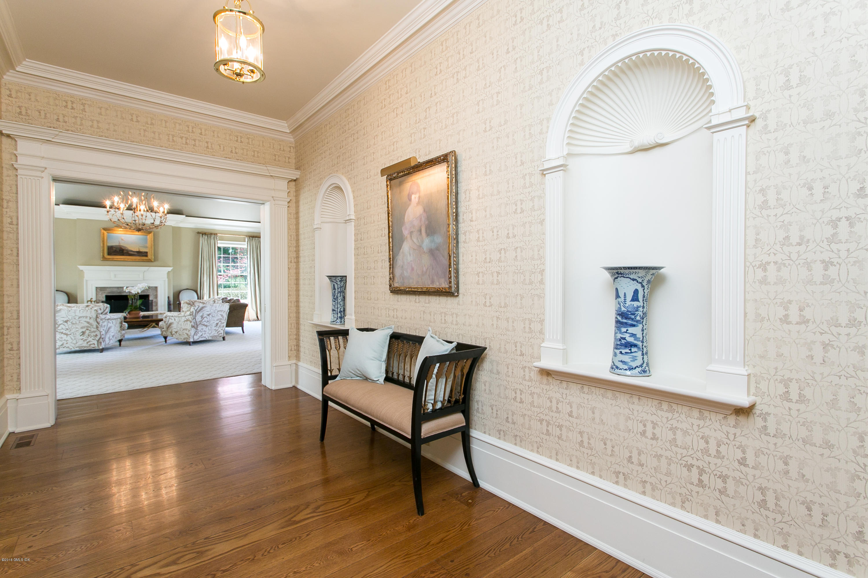 449 Round Hill Road Greenwich, CT 06831 - Photo 9 of 57 a view of a livingroom with furniture and wooden floor
