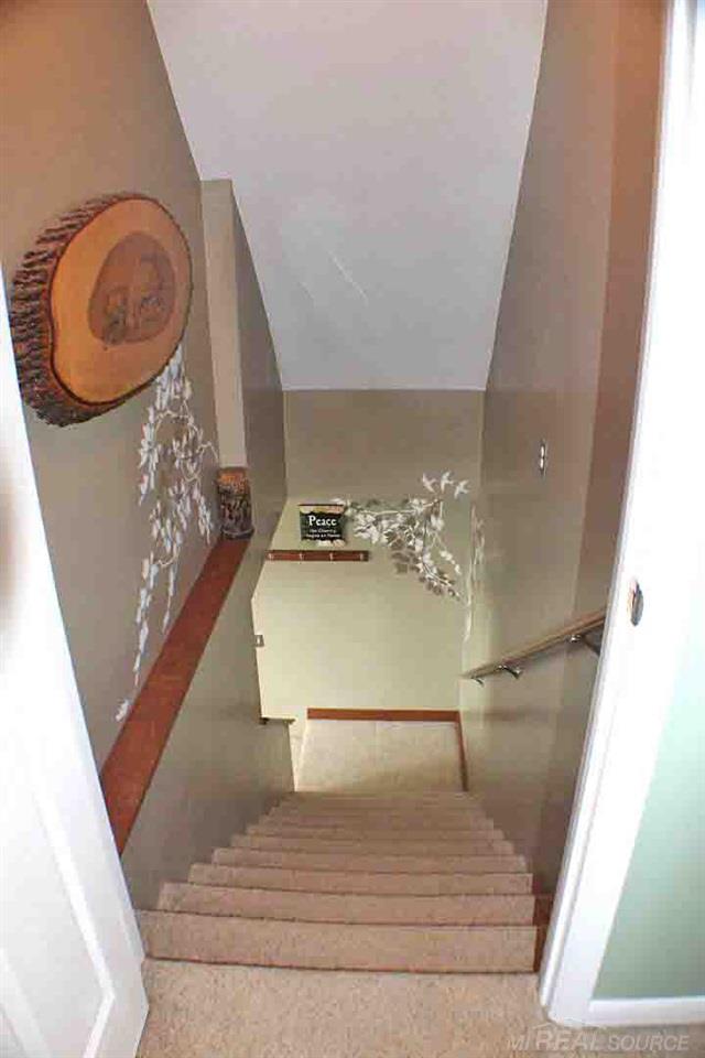 8577 Peck Road Marlette, MI 48453 - Photo 21 of 27 This is the stairwell leading down to the open living, dining room and kitchen