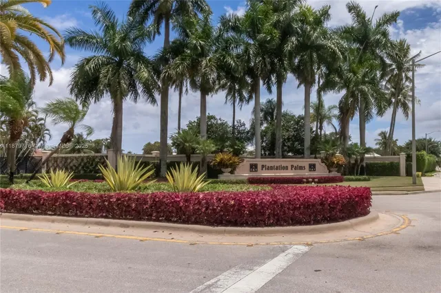 a house with palm tree in front of it