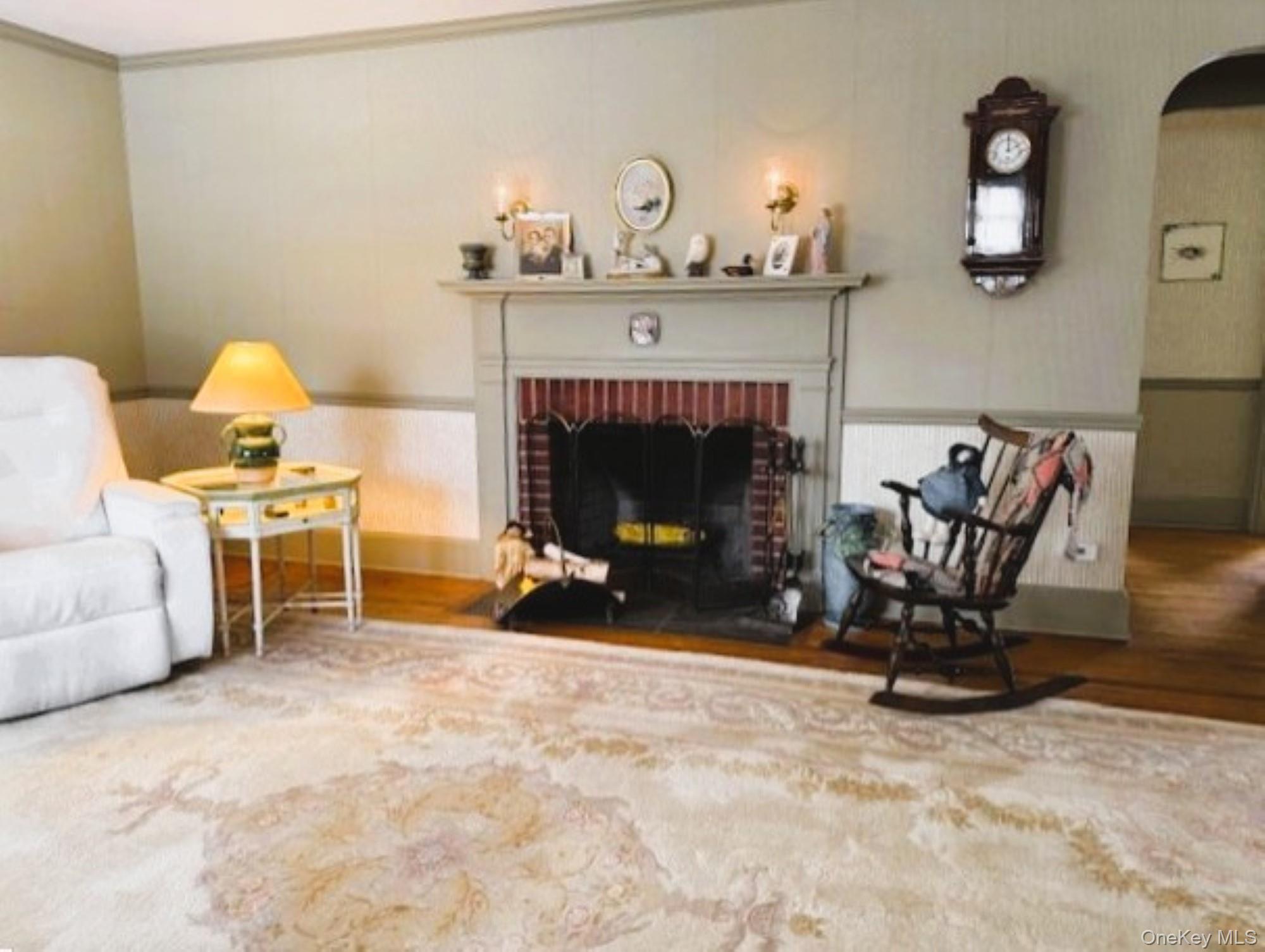 10 Phillips Street Red Hook, NY 12571 - Photo 2 of 27 Beautiful Hardwood floors throughout! Seller says its a working fireplace!