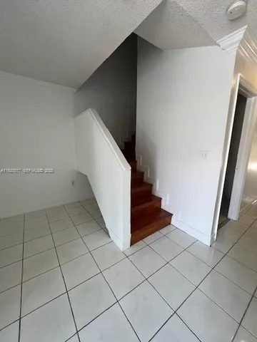 a bathroom with a sink and washing machine