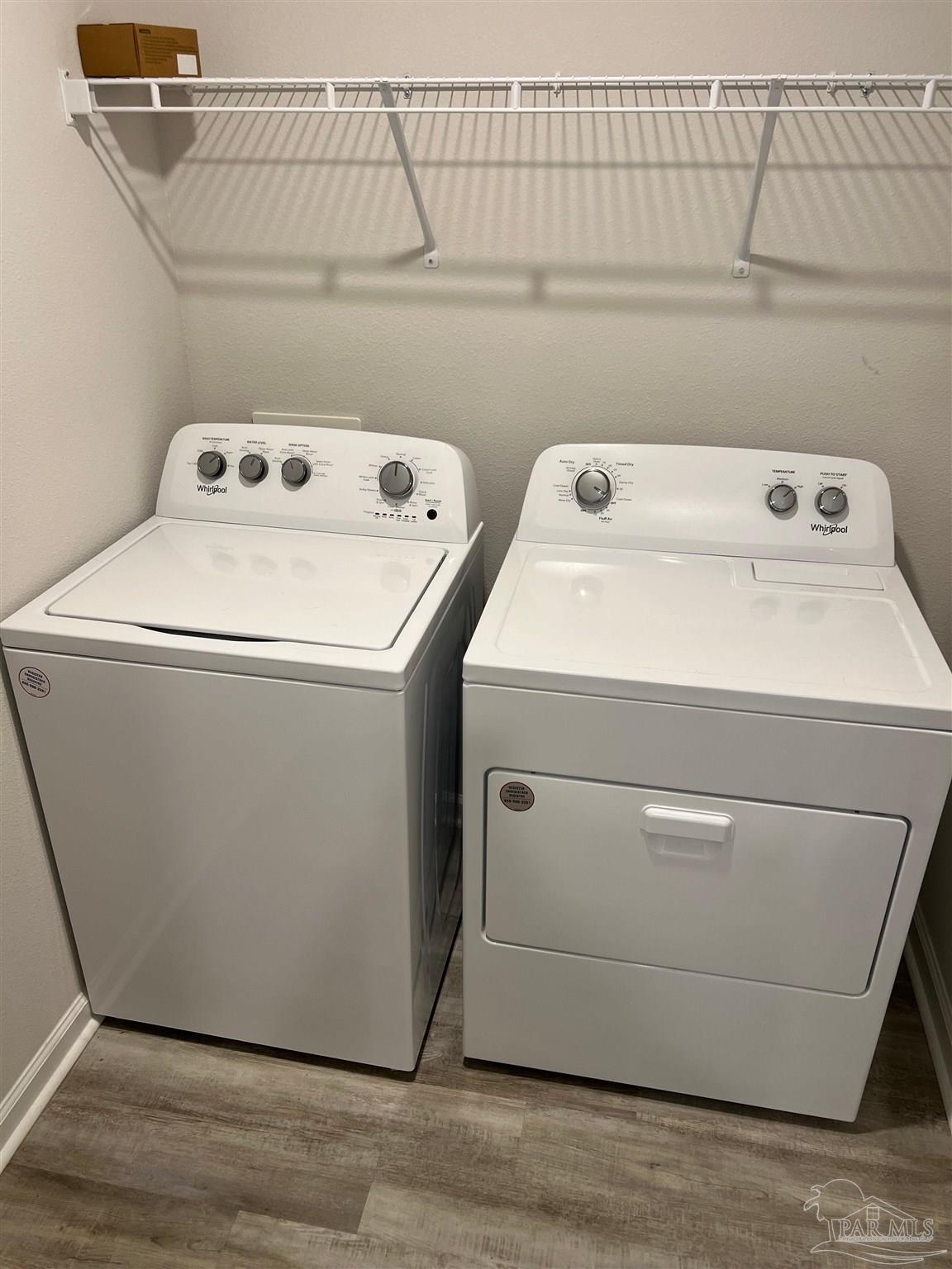 6235 June Bug Drive Milton, FL 32583 - Photo 14 of 20 a utility room with dryer and washer