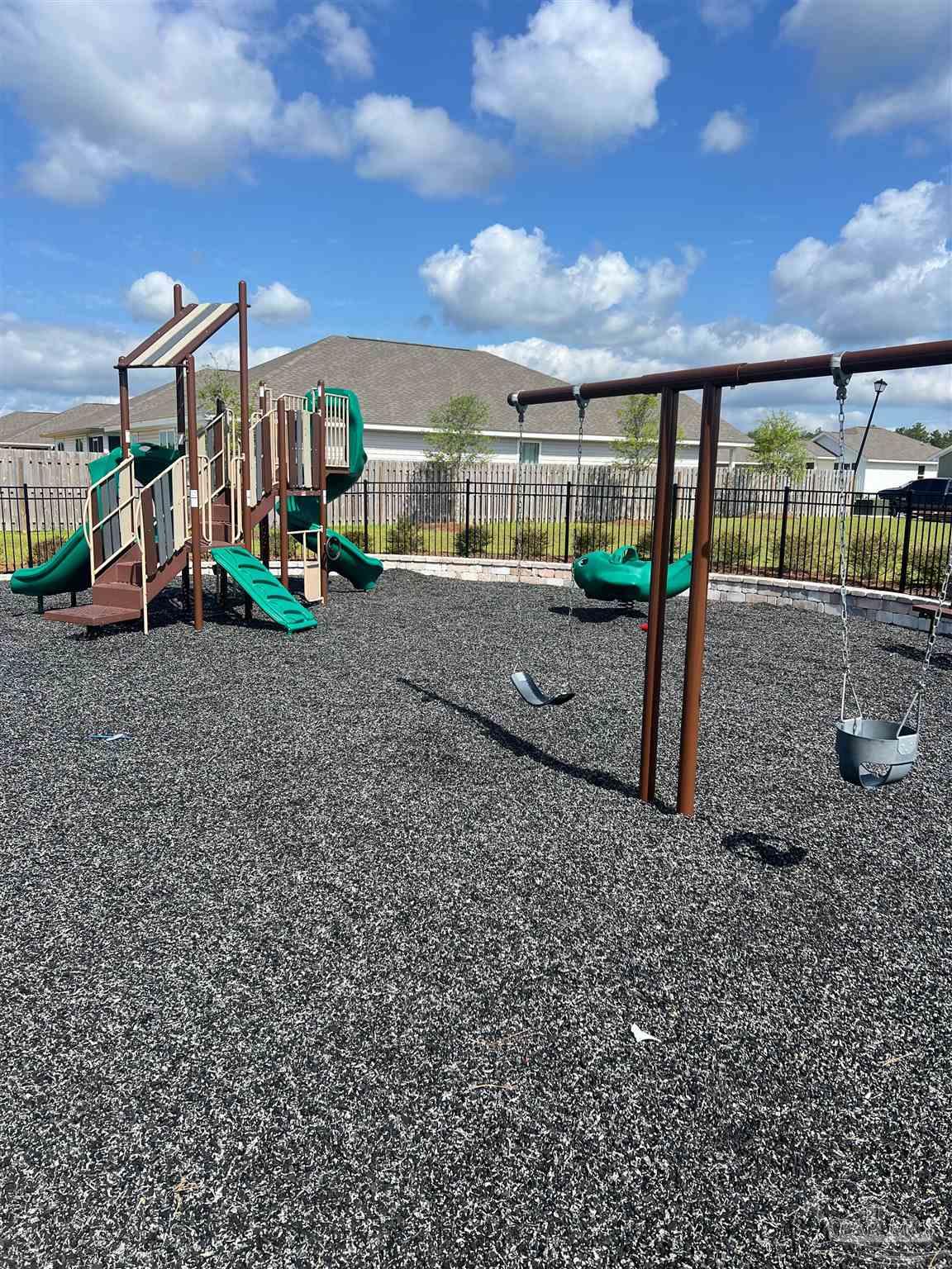 6235 June Bug Drive Milton, FL 32583 - Photo 20 of 20 a view of a entertaining space in front of the house