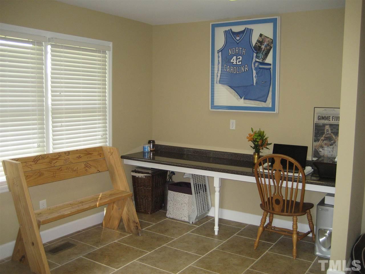 9740 South Lowell Road Bahama, NC 27503 - Photo 5 of 17 a reading room with furniture and window