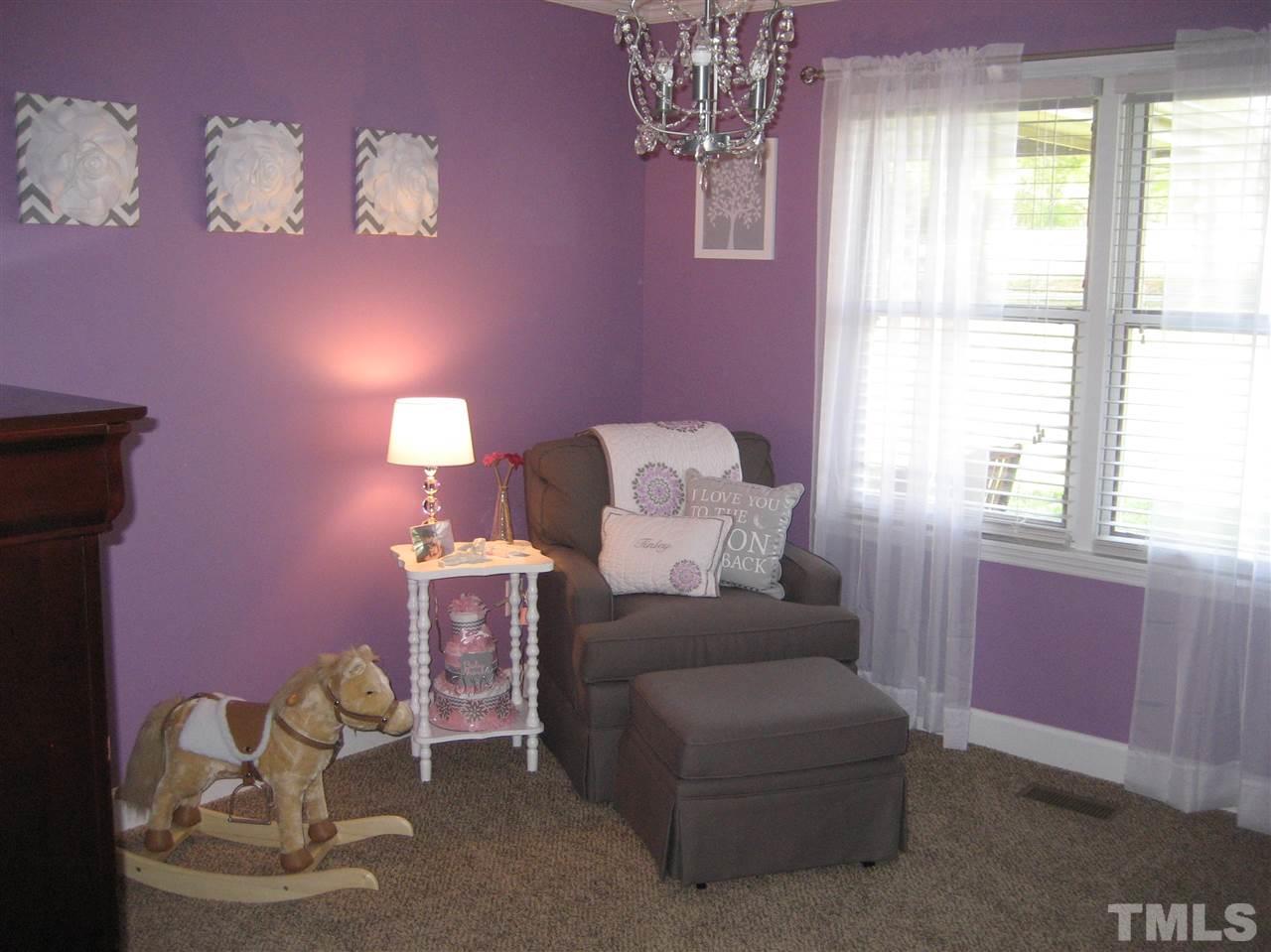 9740 South Lowell Road Bahama, NC 27503 - Photo 8 of 17 a living room with furniture and a window