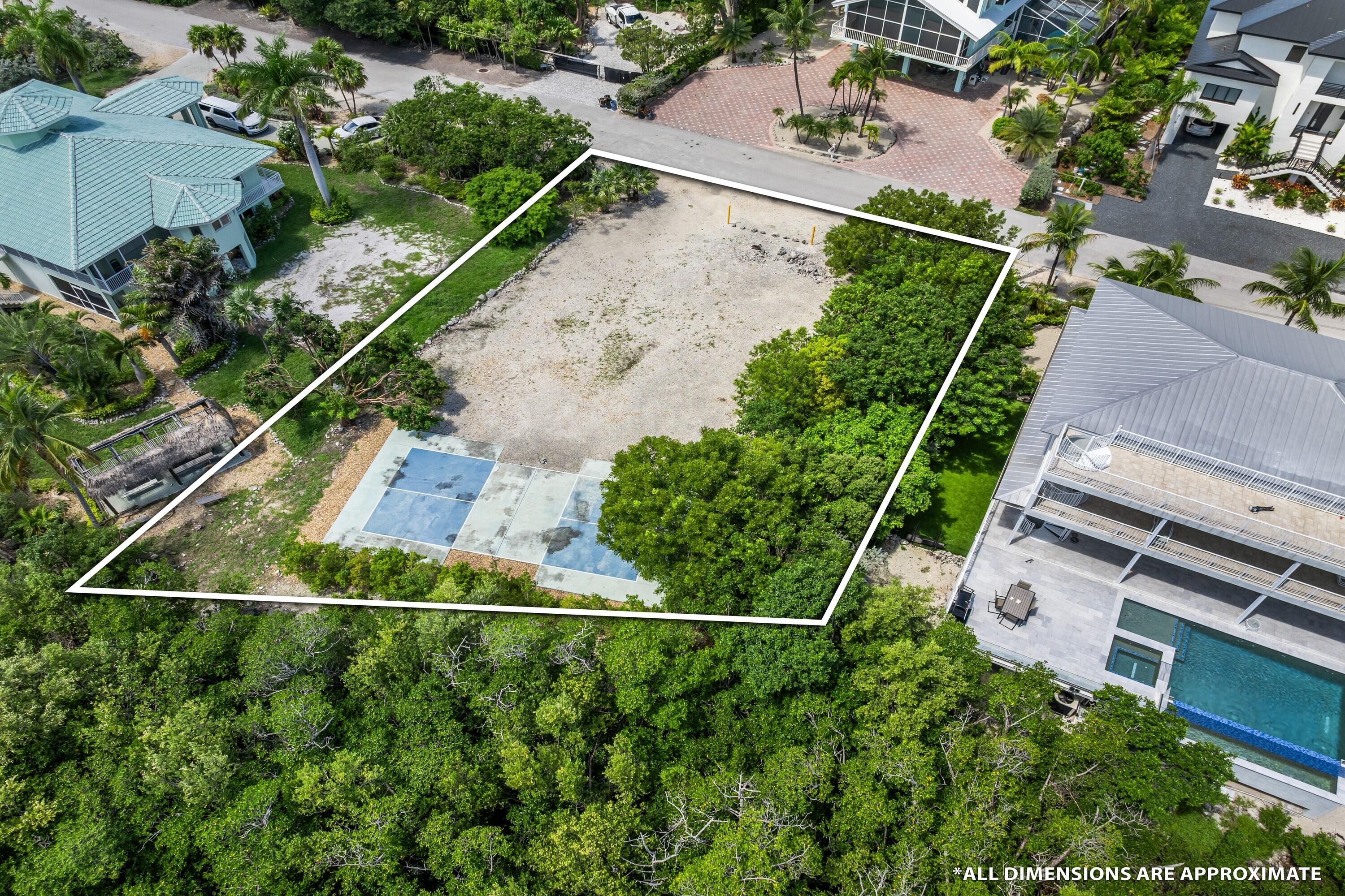 313 Stirrup Key Boulevard Marathon, FL 33050 - Photo 3 of 15 an aerial view of a house