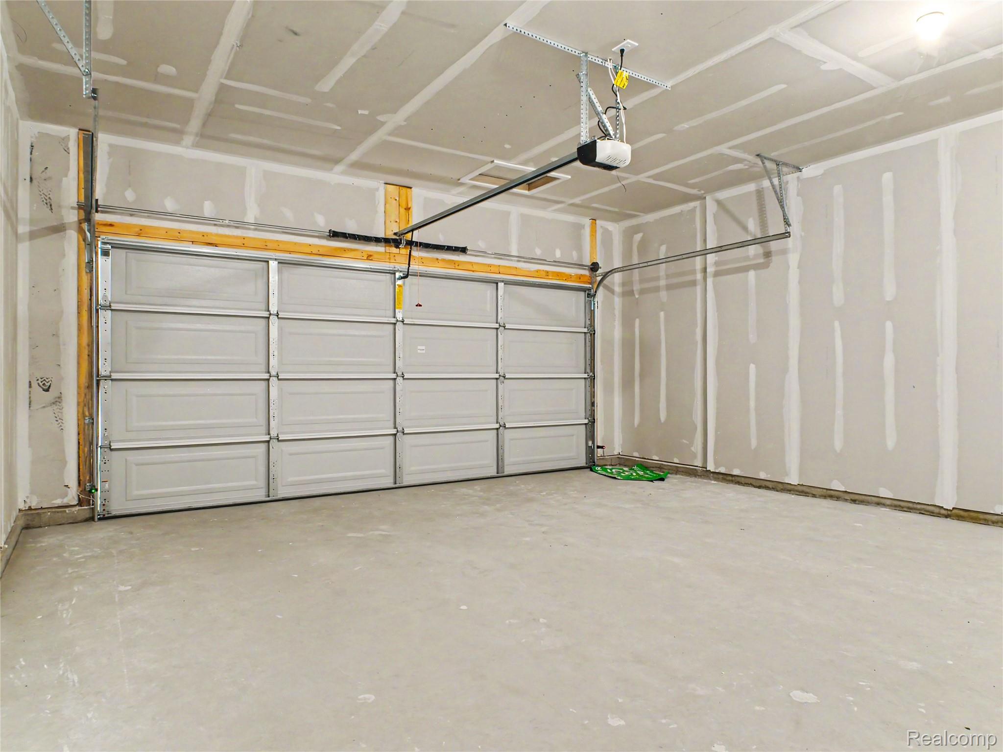 3185 Quail Ridge Court Clio, MI 48420 - Photo 18 of 35 2 stall attached garage