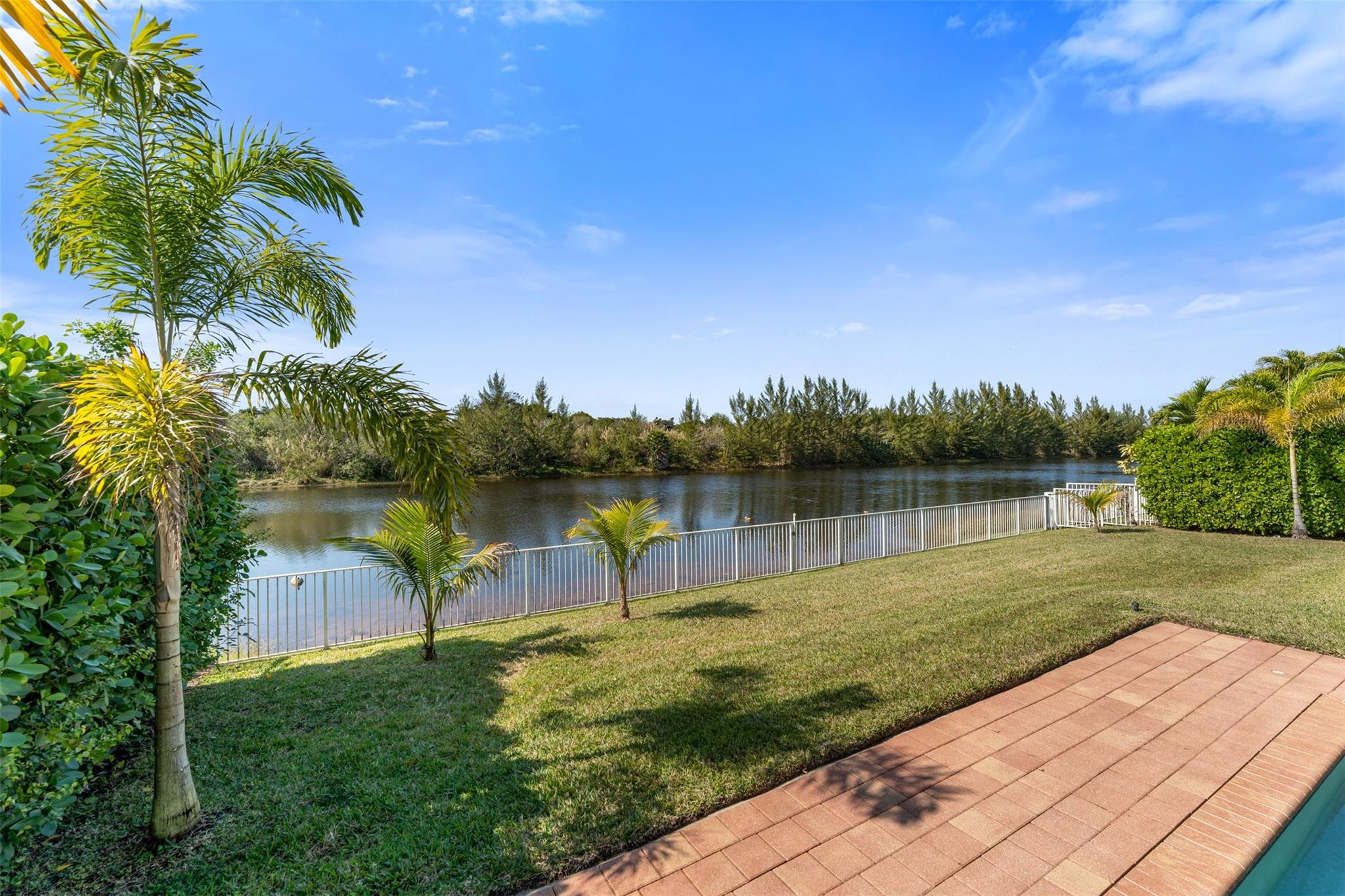 5318 Southwest 195th Terrace Miramar, FL 33029 - Photo 30 of 67 a view of a lake with a big yard