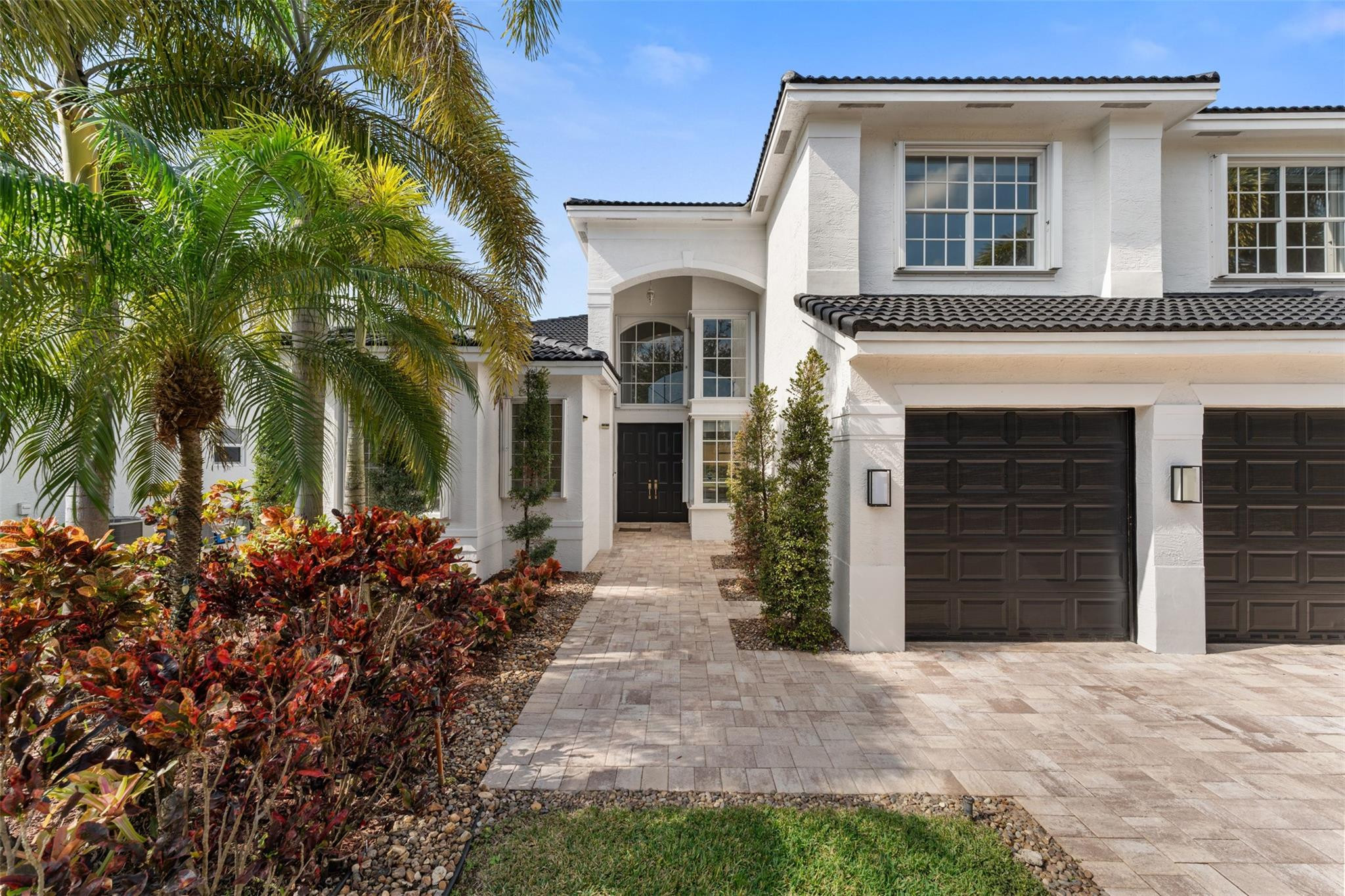 5318 Southwest 195th Terrace Miramar, FL 33029 - Photo 3 of 67 front view of a house with a yard