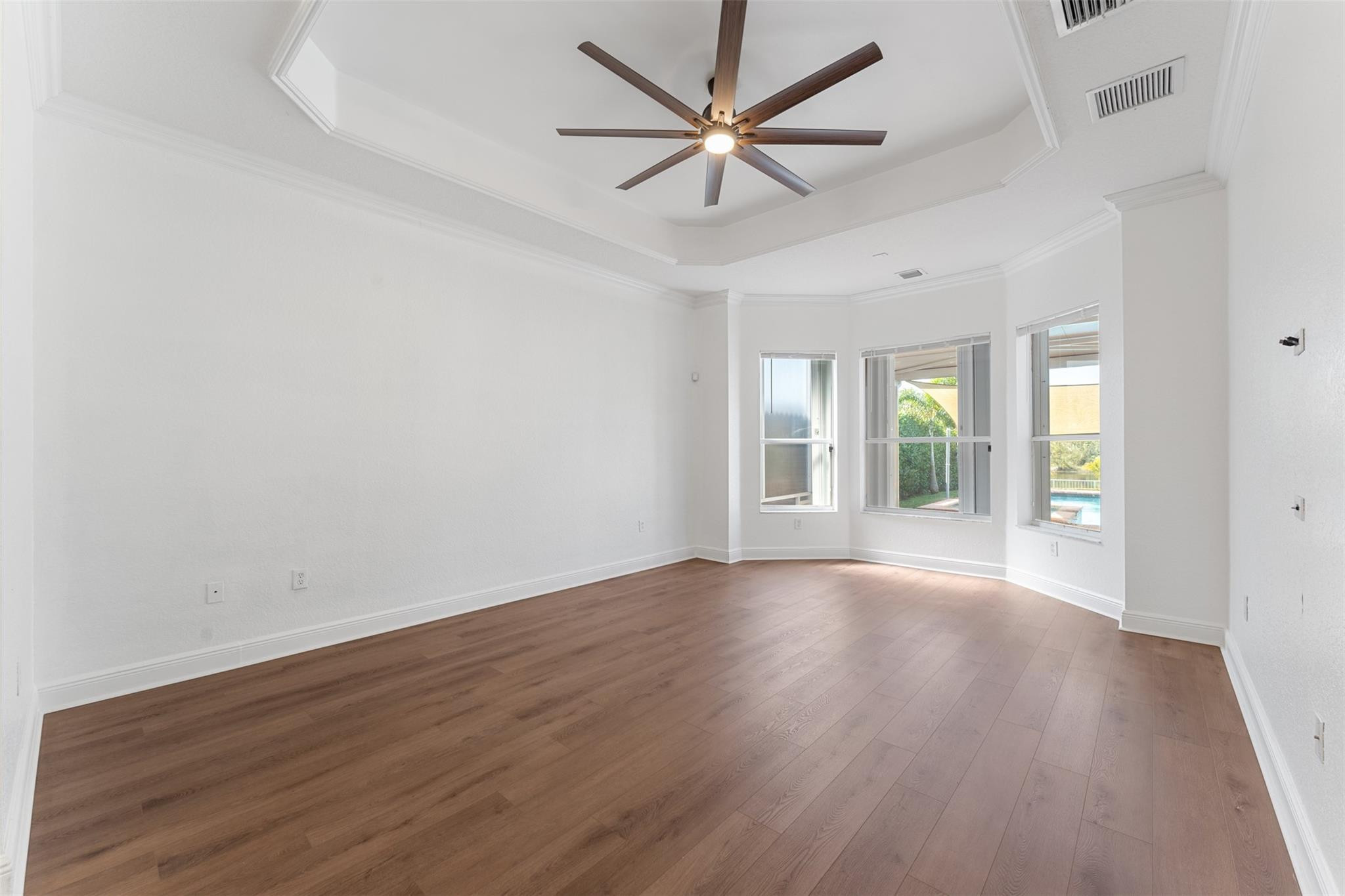 5318 Southwest 195th Terrace Miramar, FL 33029 - Photo 32 of 67 an empty room with wooden floor and windows