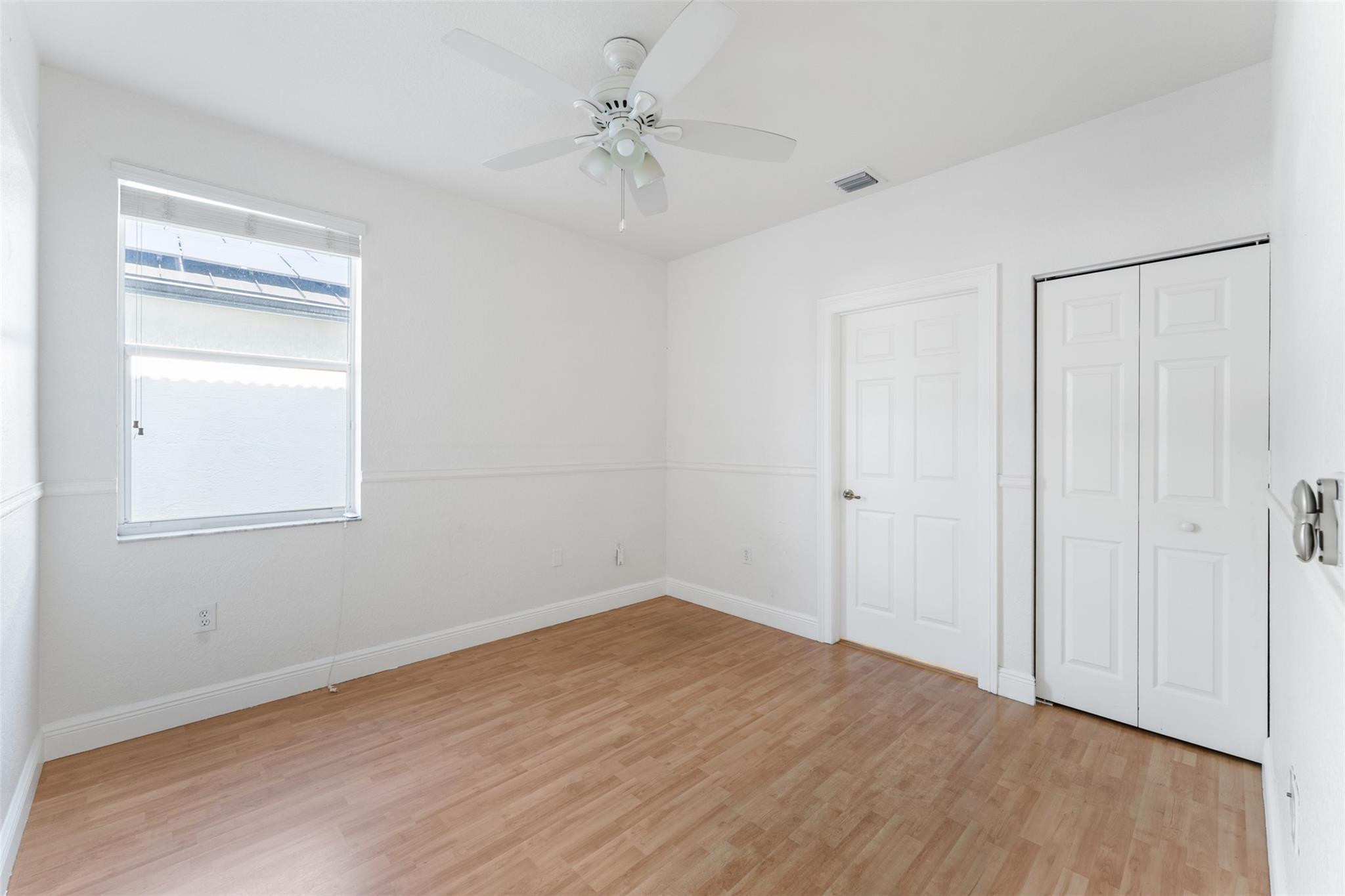 5318 Southwest 195th Terrace Miramar, FL 33029 - Photo 38 of 67 a view of an empty room with wooden floor