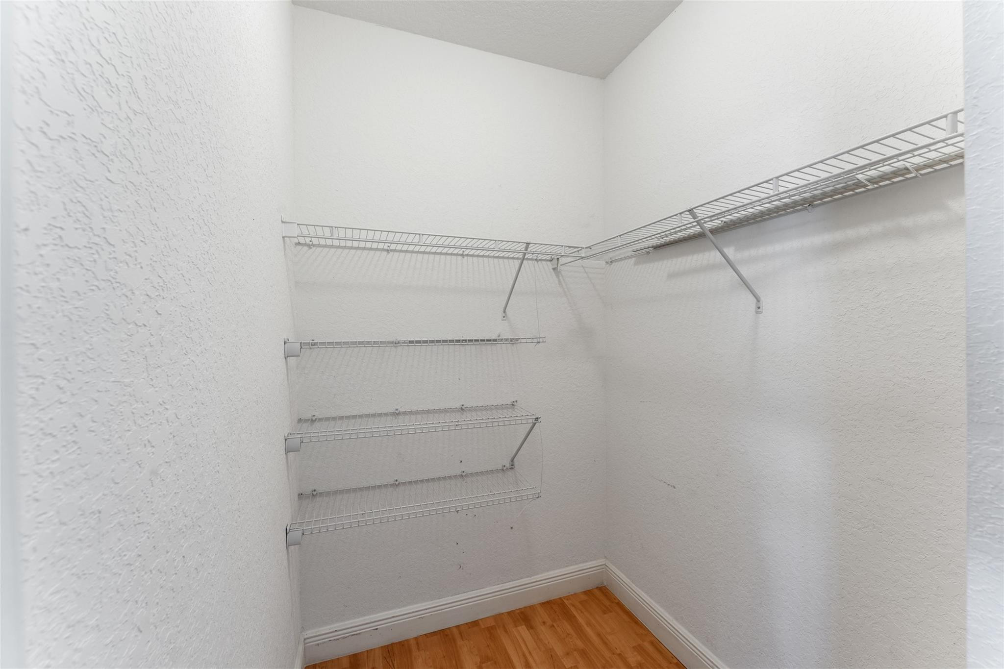 5318 Southwest 195th Terrace Miramar, FL 33029 - Photo 40 of 67 a view of a room with racks on the wall