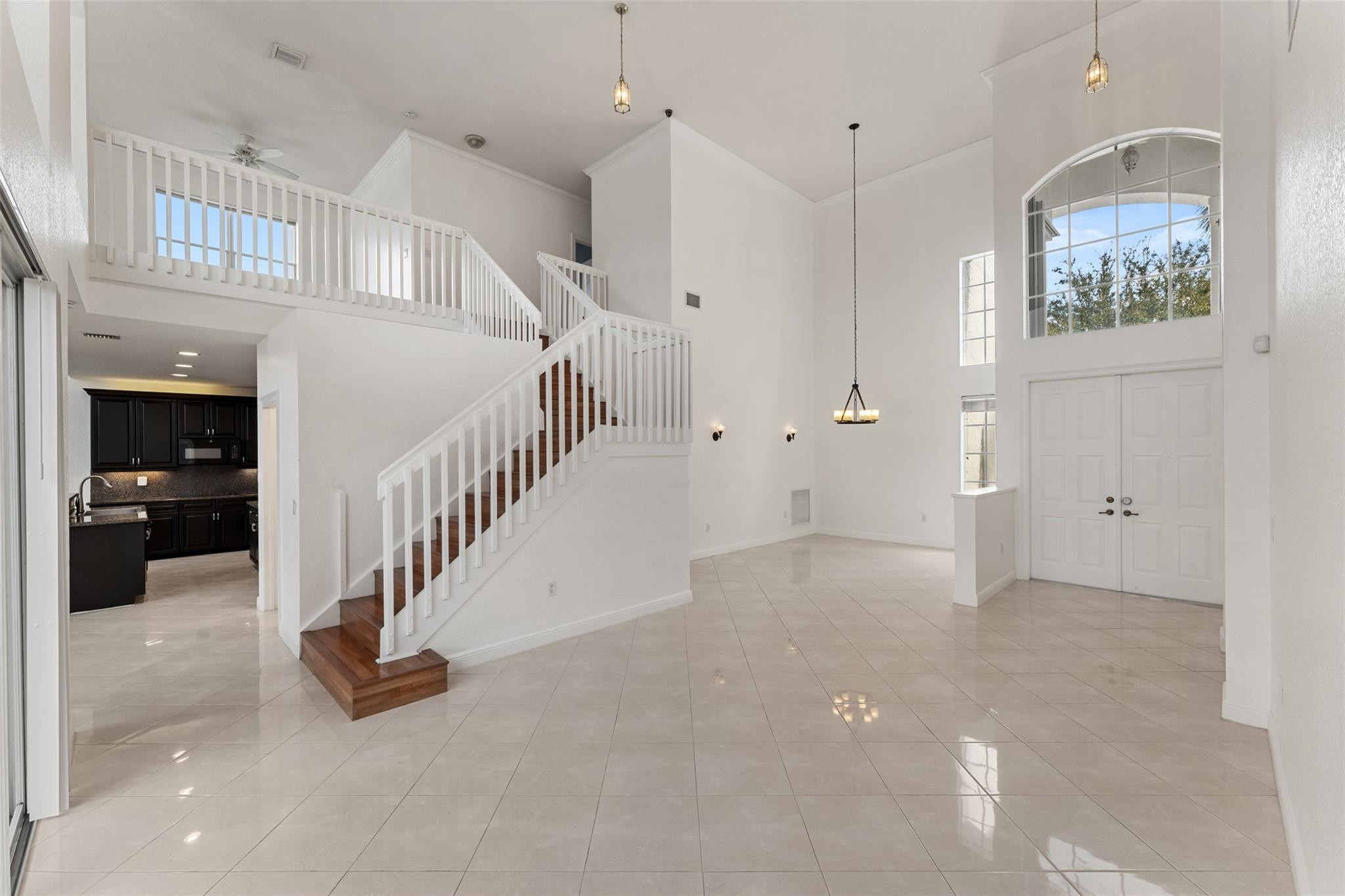 5318 Southwest 195th Terrace Miramar, FL 33029 - Photo 4 of 67 a view of entryway and hall with a front door