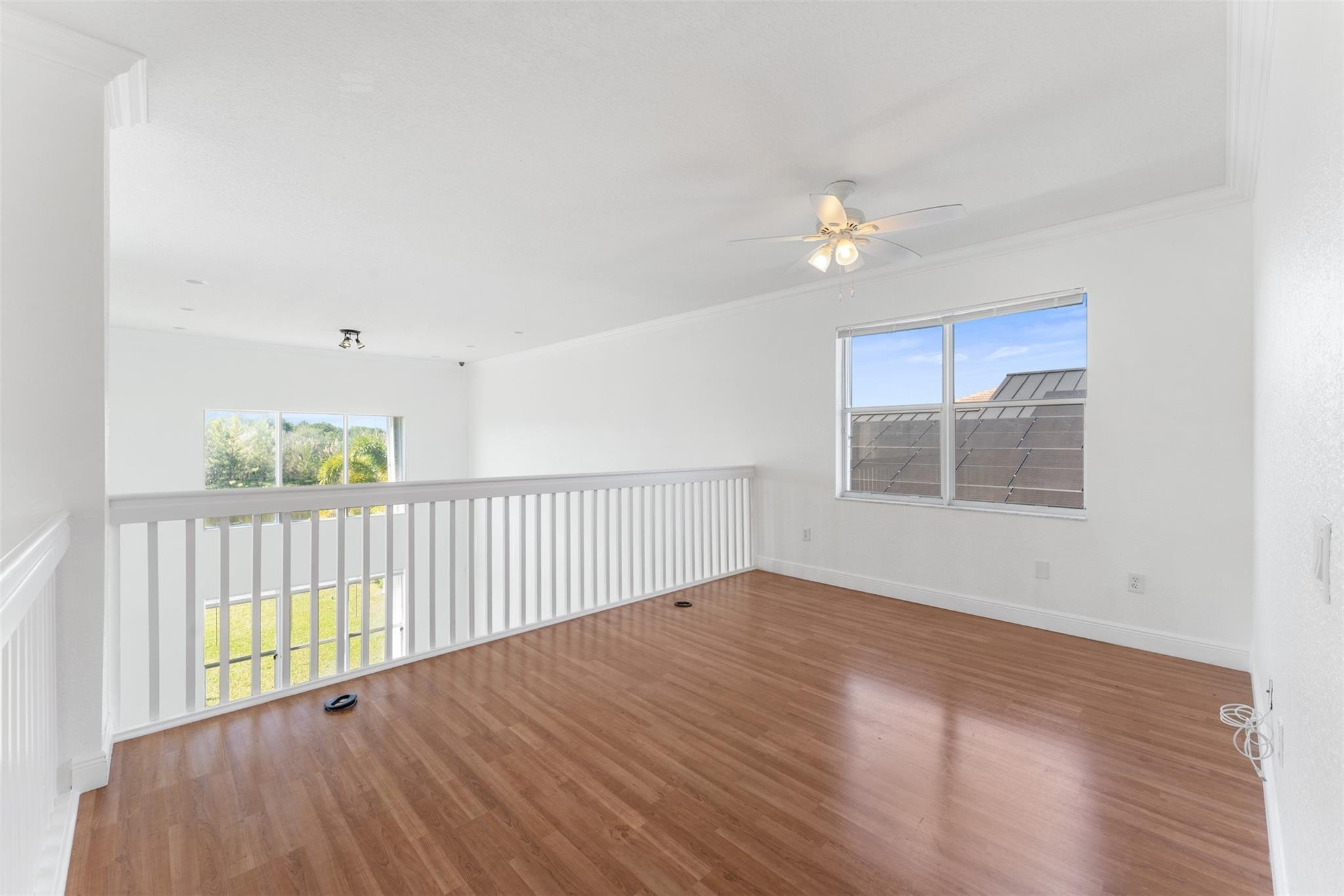 5318 Southwest 195th Terrace Miramar, FL 33029 - Photo 42 of 67 a view of an empty room with wooden floor