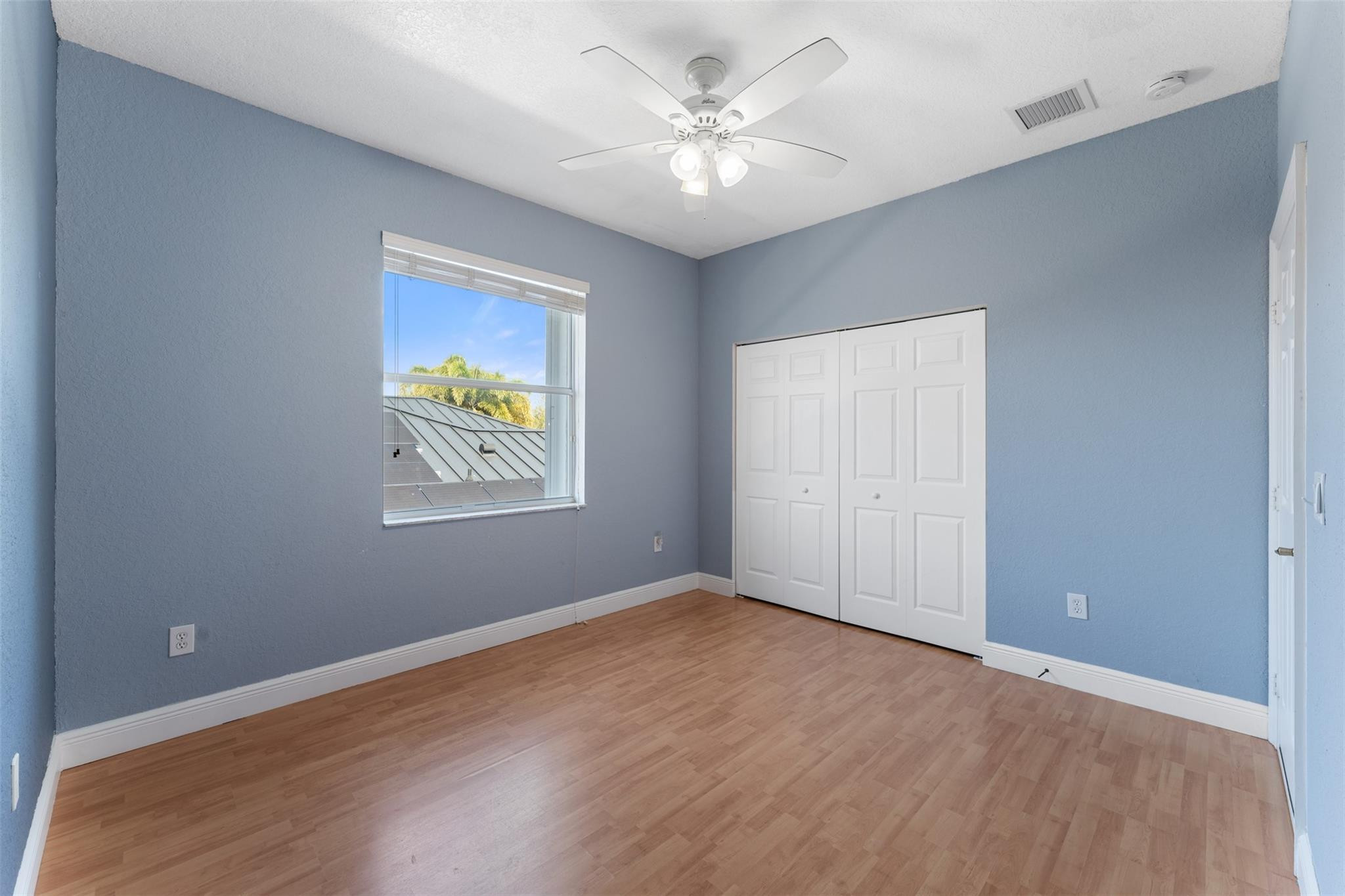 5318 Southwest 195th Terrace Miramar, FL 33029 - Photo 47 of 67 wooden floor in an empty room with a window