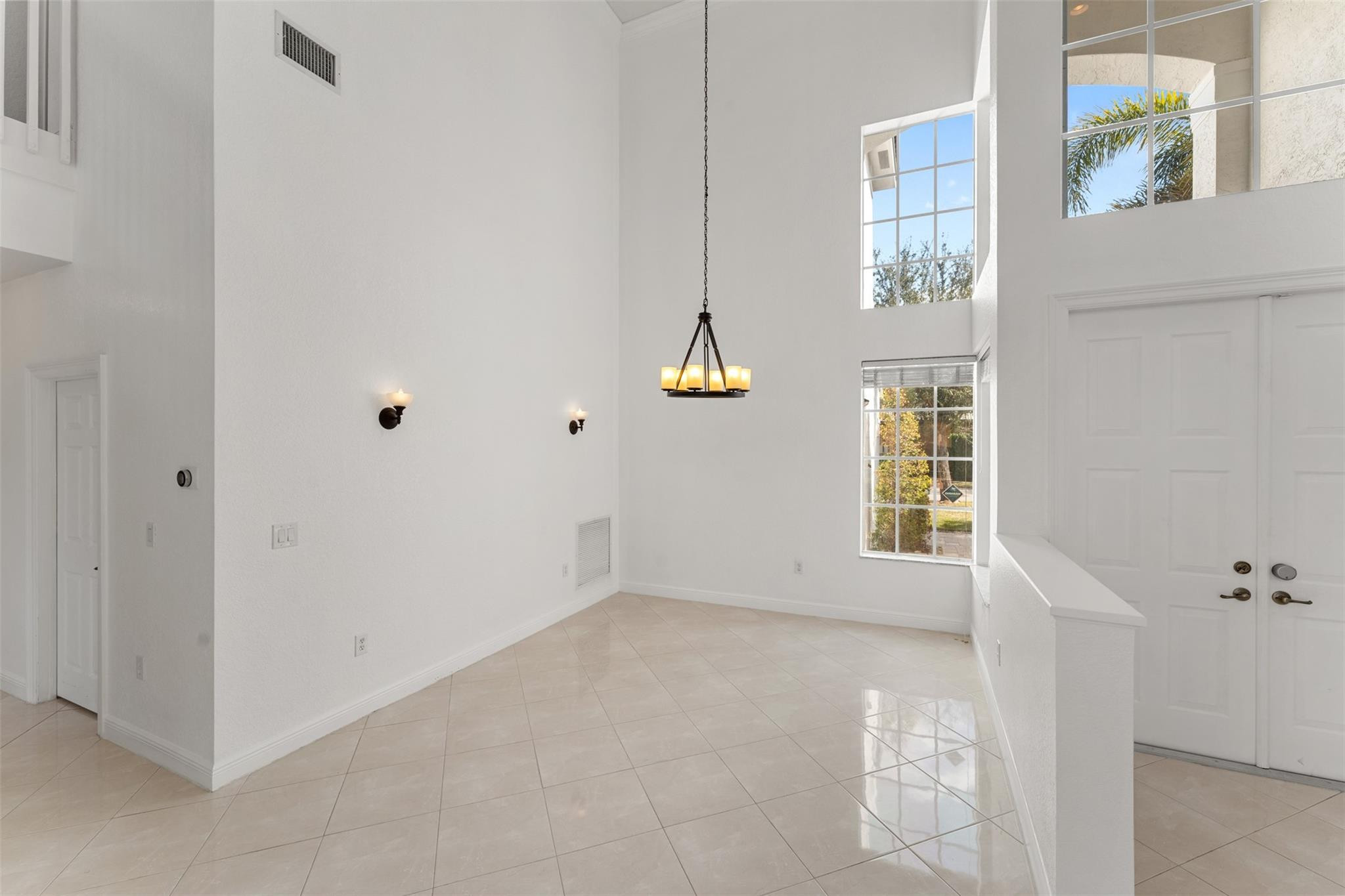 5318 Southwest 195th Terrace Miramar, FL 33029 - Photo 5 of 67 a view of an empty room with a window