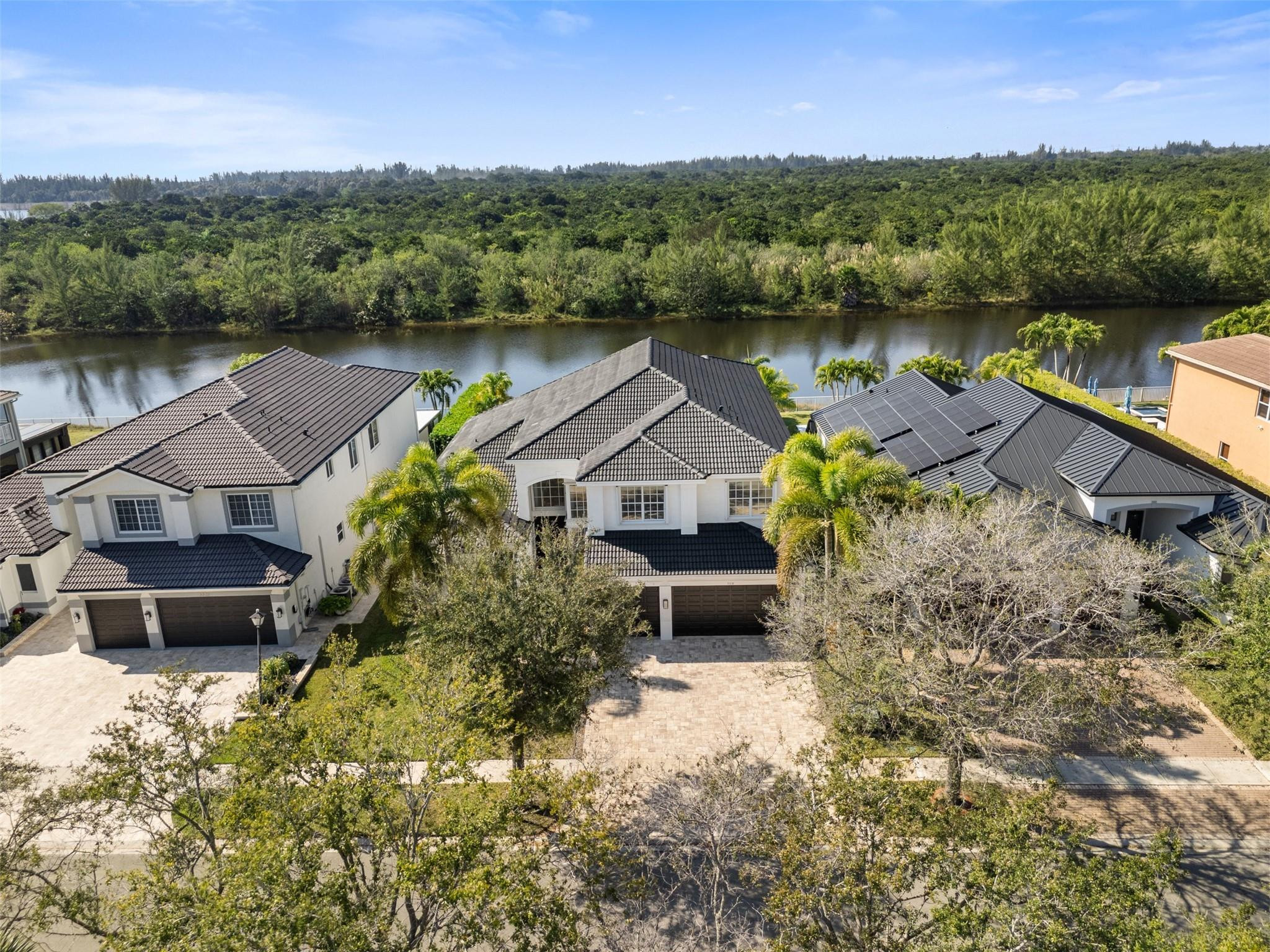 5318 Southwest 195th Terrace Miramar, FL 33029 - Photo 55 of 67 an aerial view of a house with a yard and lake view
