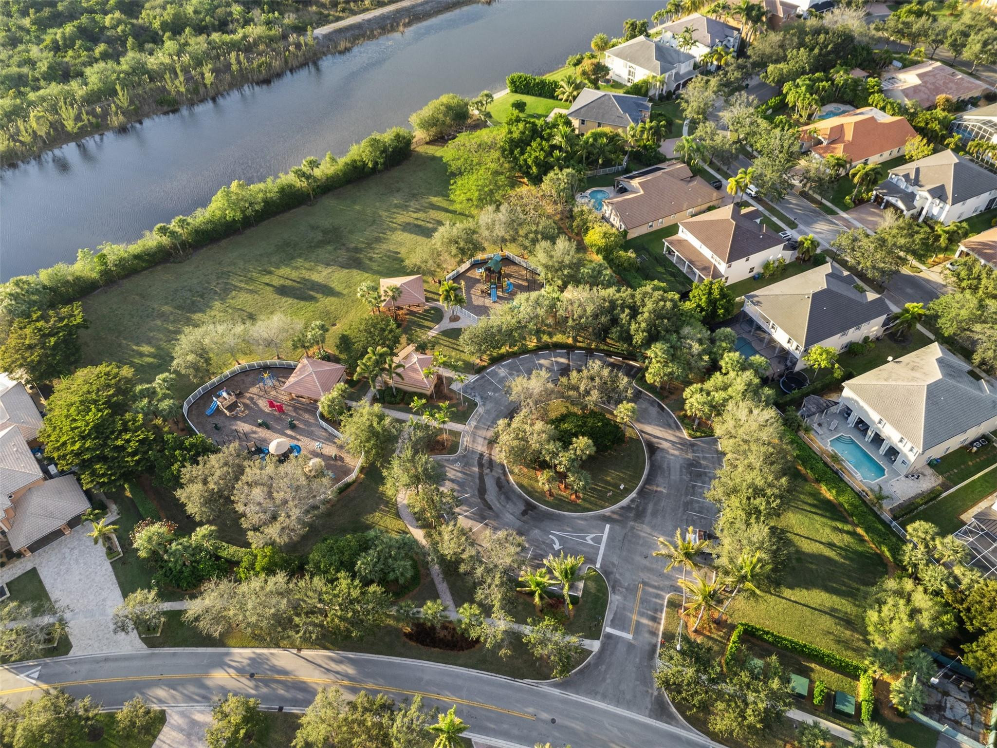 5318 Southwest 195th Terrace Miramar, FL 33029 - Photo 65 of 67 an aerial view of a house with a yard and lake view
