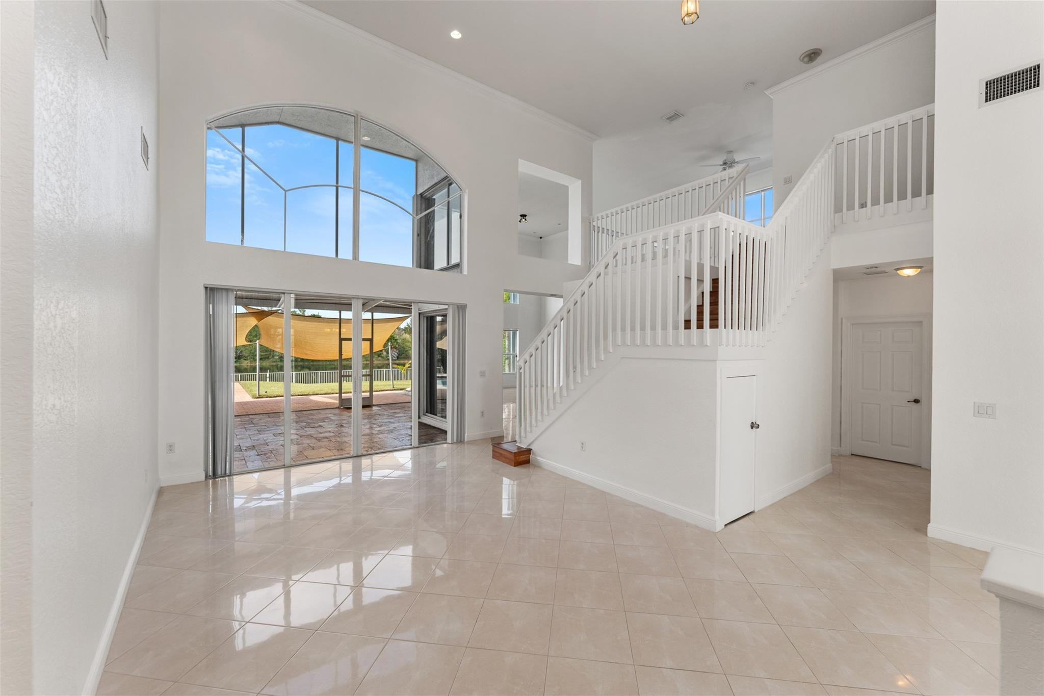 5318 Southwest 195th Terrace Miramar, FL 33029 - Photo 7 of 67 a view of an entryway with a hallway
