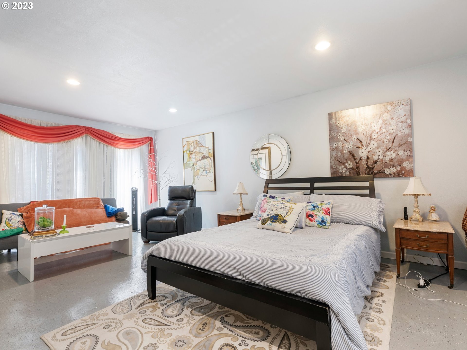 17680 Southwest Alexander Street Beaverton, OR 97003 - Photo 19 of 38 a bedroom with a bed and a couch