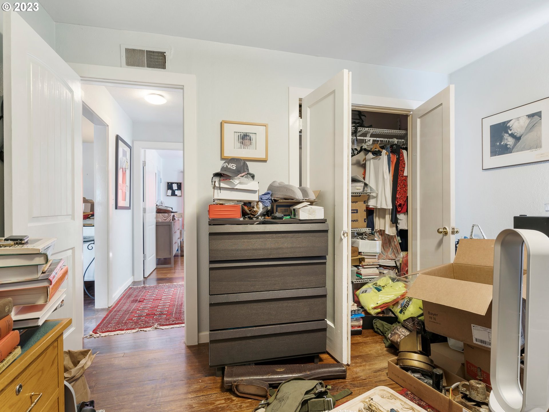 17680 Southwest Alexander Street Beaverton, OR 97003 - Photo 27 of 38 a view of walk in closet with clothes and shoes