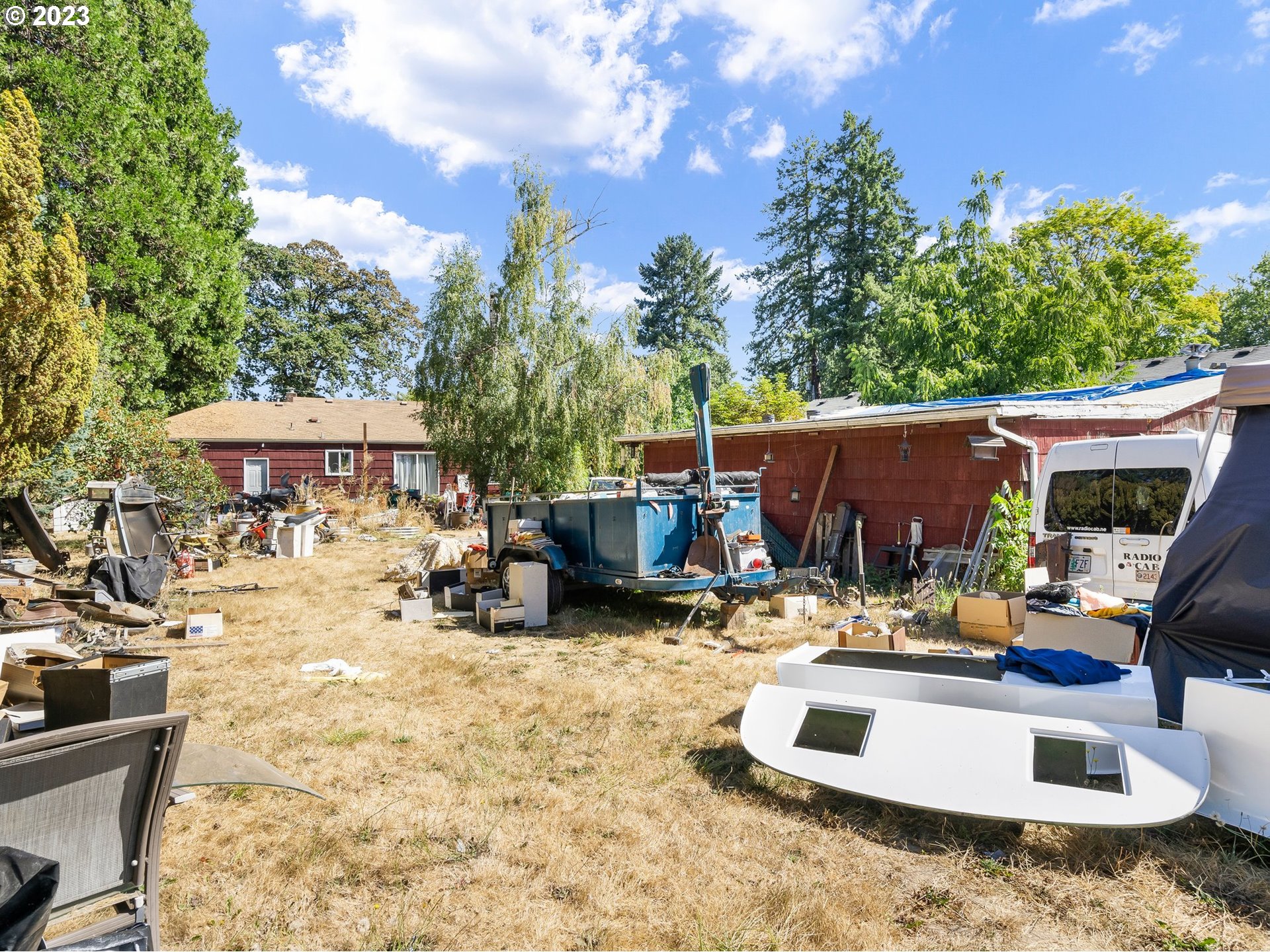 17680 Southwest Alexander Street Beaverton, OR 97003 - Photo 31 of 38 a view of a backyard with a patio