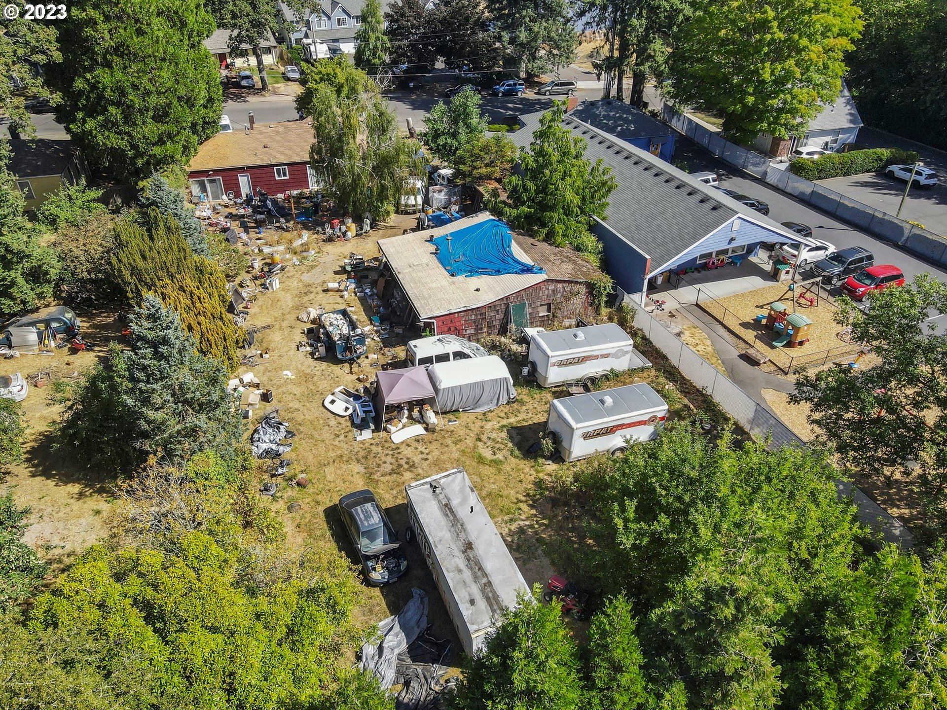 17680 Southwest Alexander Street Beaverton, OR 97003 - Photo 35 of 38 an aerial view of a house with swimming pool and garden view
