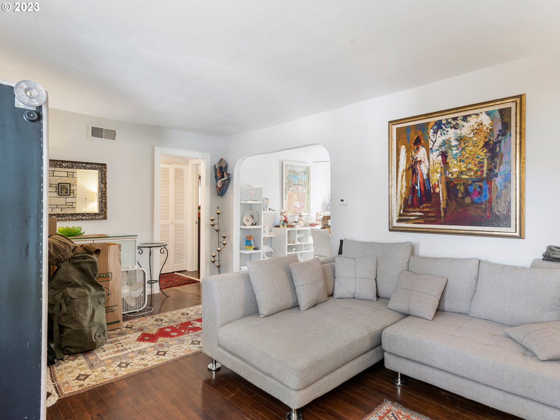 17680 Southwest Alexander Street Beaverton, OR 97003 - Photo 8 of 38 a living room with furniture and a couch