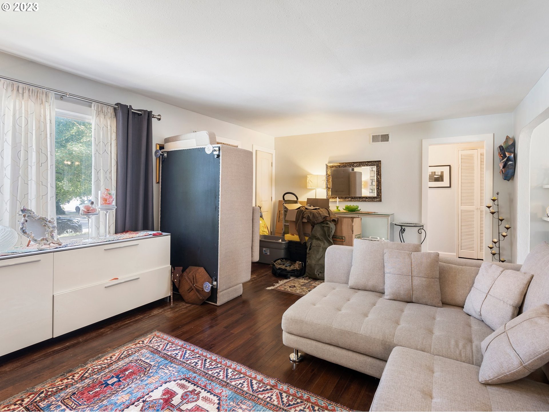 17680 Southwest Alexander Street Beaverton, OR 97003 - Photo 9 of 38 a living room with furniture and a window