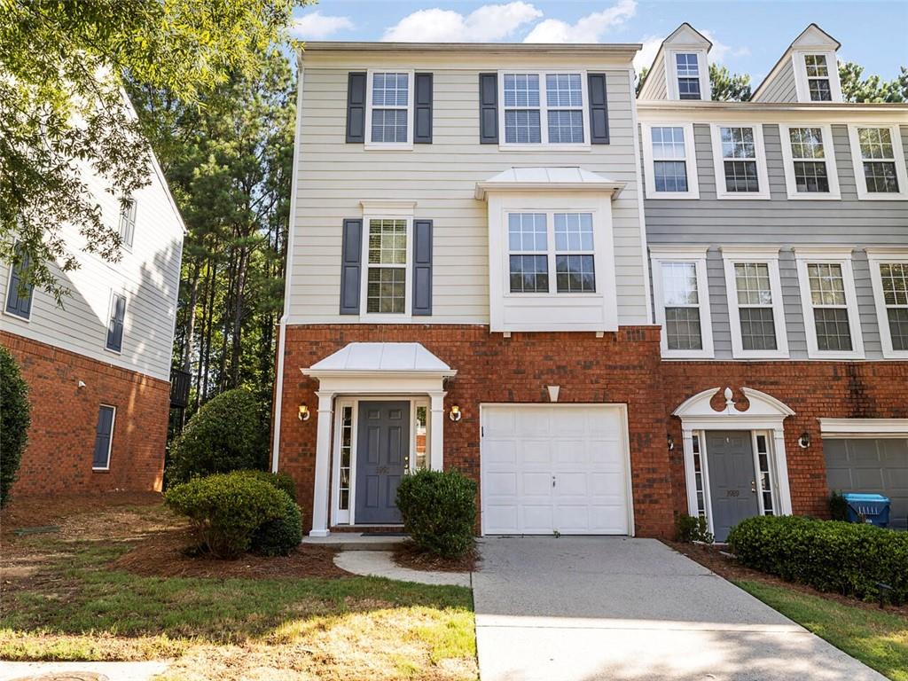 3991 Howell Park Road Duluth, GA 30096 - Photo 1 of 1 a front view of a house with a yard