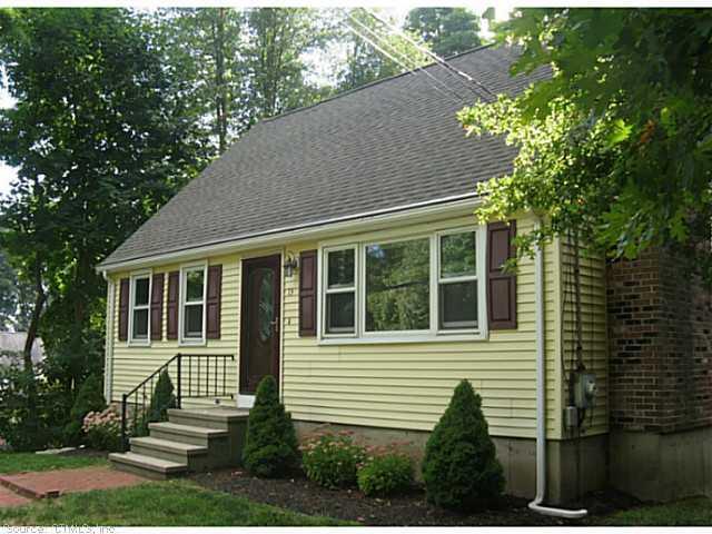 13 Beach Park Road Clinton, CT 06413 - Photo 1 of 1 a house that has a tree in front of the house