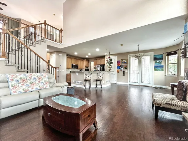 a living room with furniture and a table